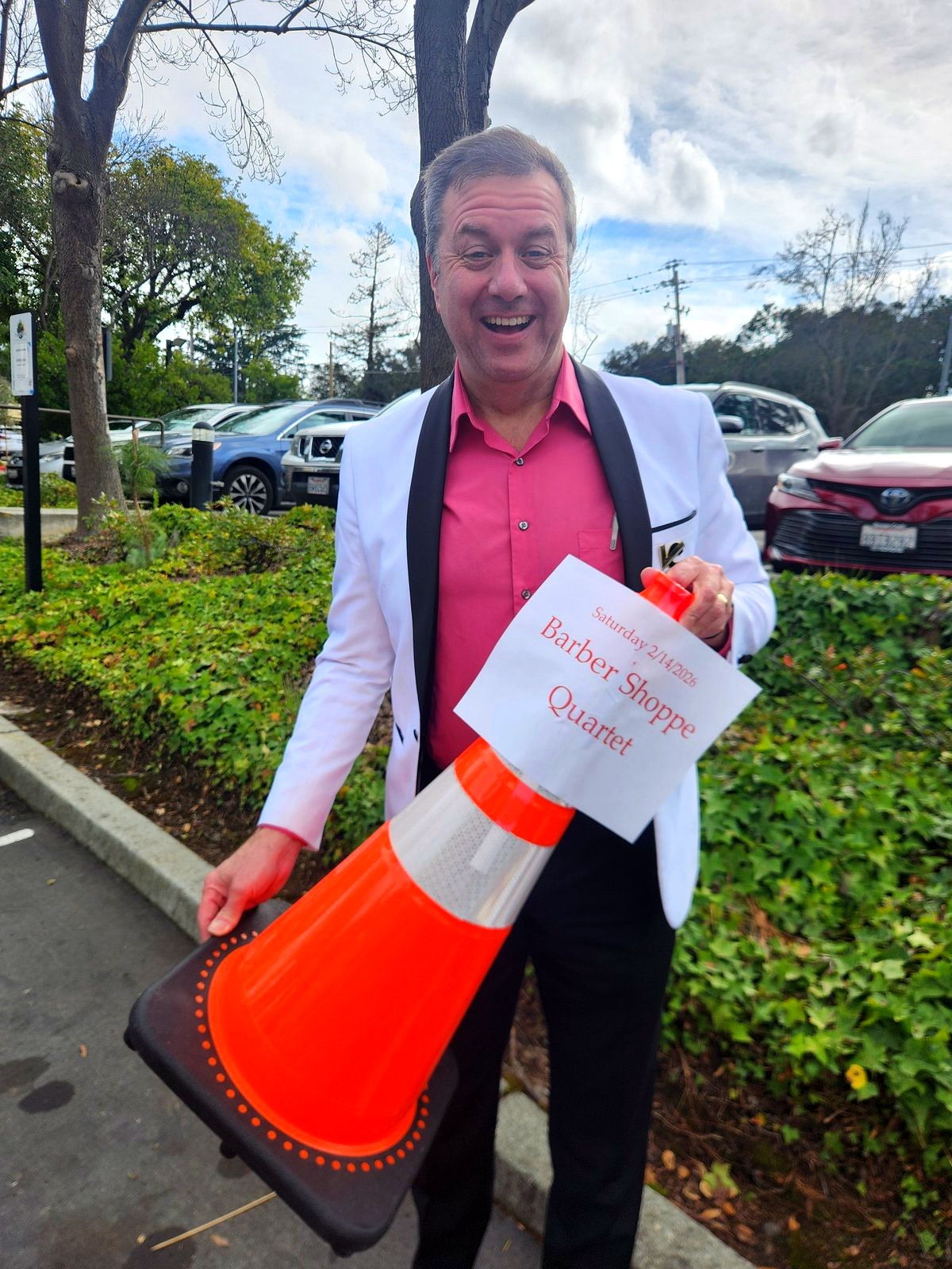 Vocal Capital member posing with a traffic cone
